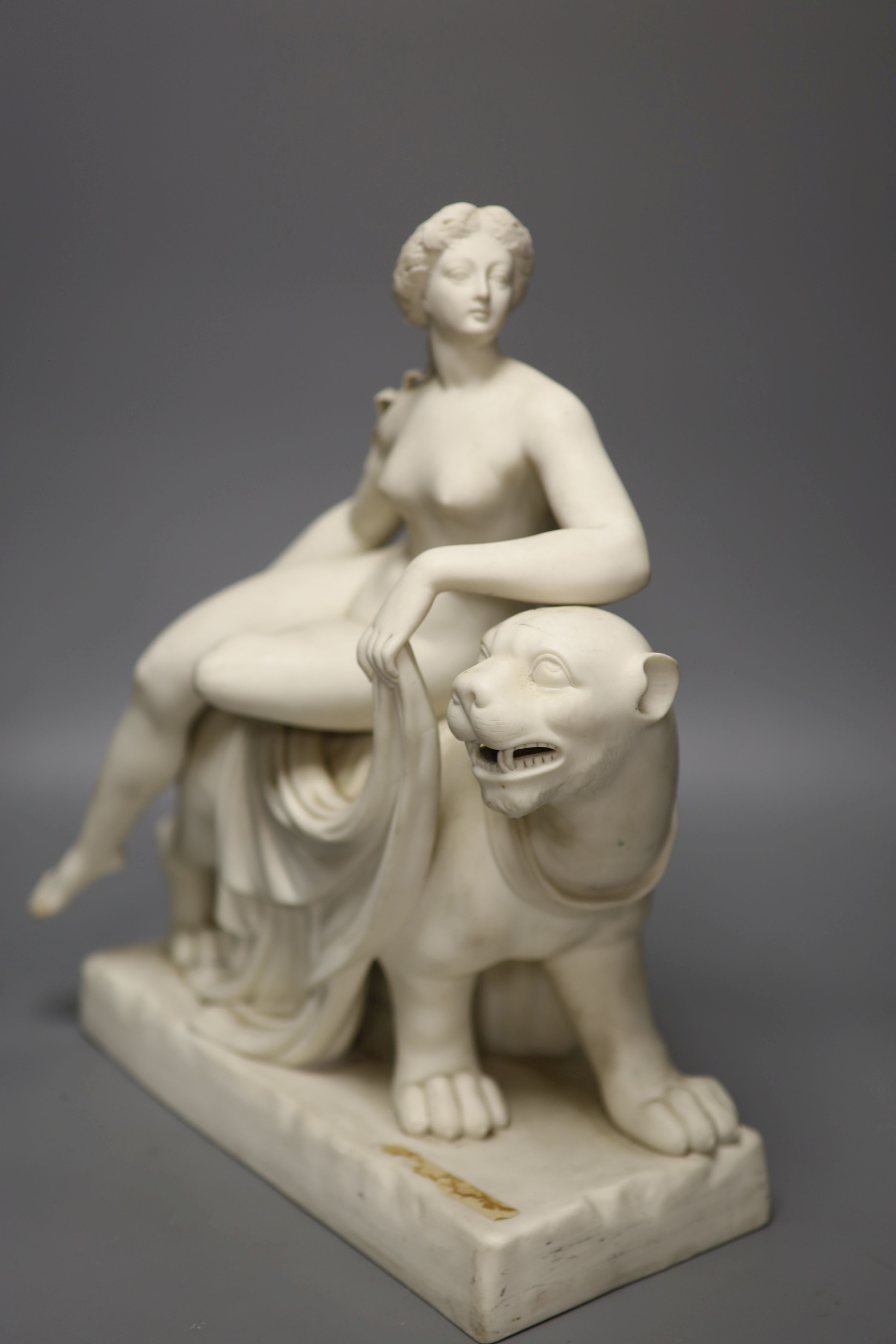 A Minton parianware figure of Ariadne and the panther, height 37cm